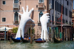 Viennaslide-06871706 Lorenzo Quinn Sculpture 'Support' Highlights the Threat of Climate Change